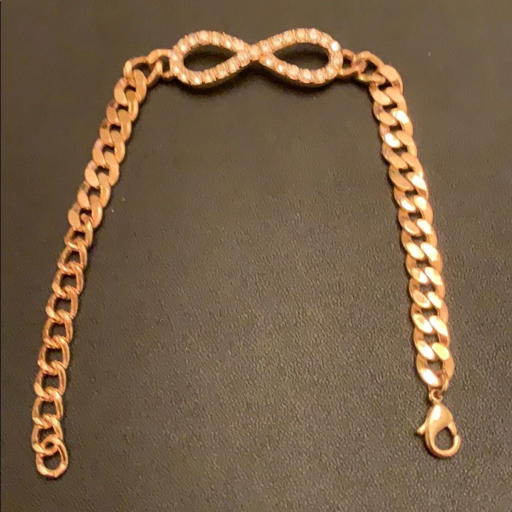 Gold-tone bracelet with rhinestone infinity charm